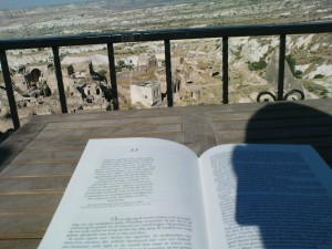 My copy of 'Foucault's Pendulum' overlooking the Pigeon Valley from the rooftop at Has Konak in Cappadocia